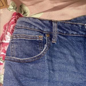 Women’s jeans with rips on knees. Size 17